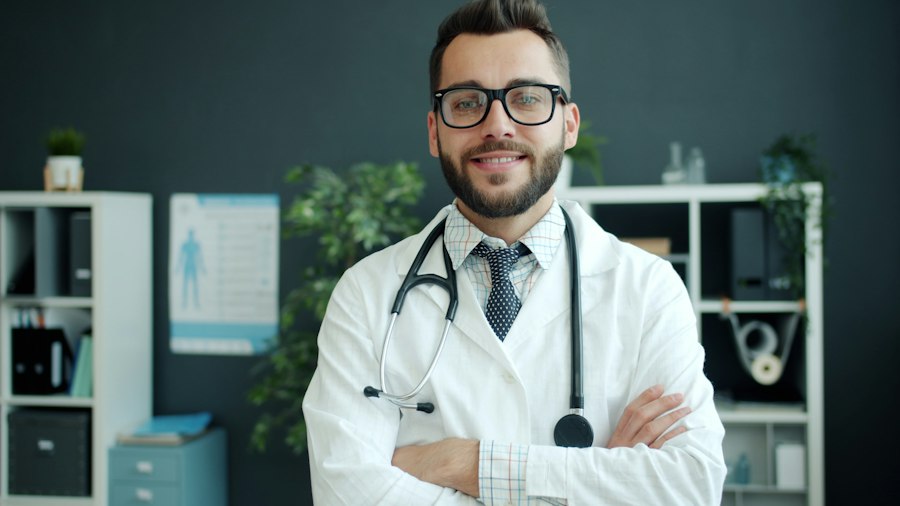 Smiling dentist with glasses