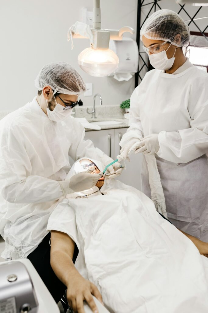 Dentists performing treatment